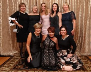 Pictured, from back row, starting from left: Denise Dionne, Nancy Warren, Donna Saal, Sarah Neadow, Karen Roosen Front Row, From Left: Lisa Edmonds, Marianne Minns, Laura Carroll Missing From Photo: Lynda Dobbs, Tatum Perham, Marcey Stefanski, and Karolyn Xie